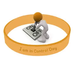 A person pressing a button labeled "I Am In Control Day," symbolizing empowerment and self-determination.