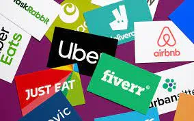 A scattered collage of various app logo graphics from gig economy platforms including Uber, Airbnb, Fiverr, TaskRabbit, Deliveroo, and Uber Eats