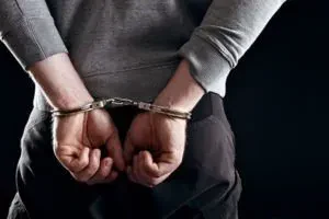 A man in handcuffs.