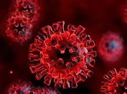 Close-up illustration of a red coronavirus particle with spike proteins, set against a dark red background with blurred viruses in the distance.