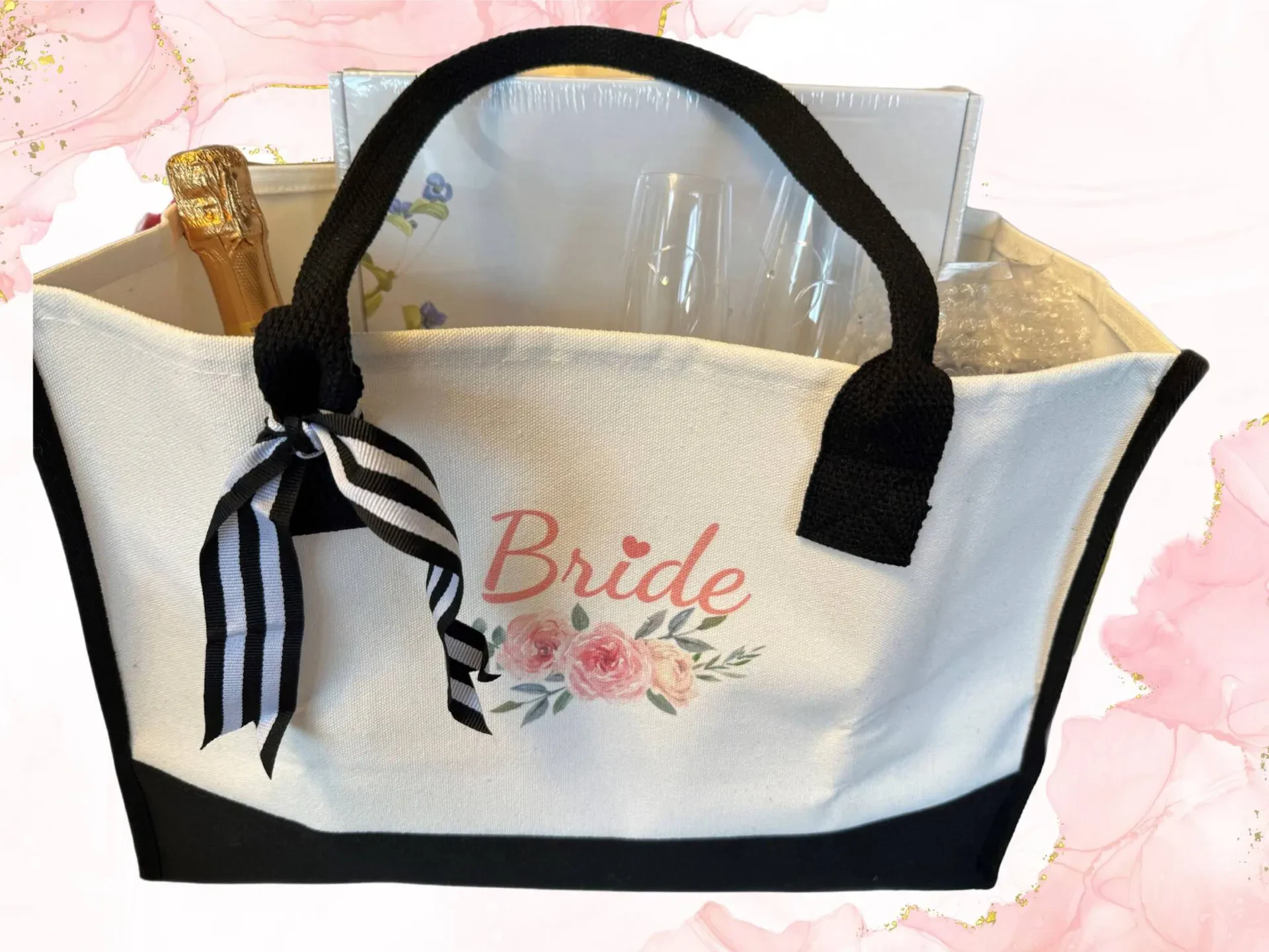This image shows a beautifully curated bridal gift basket or wedding day kit packed inside a canvas tote bag.