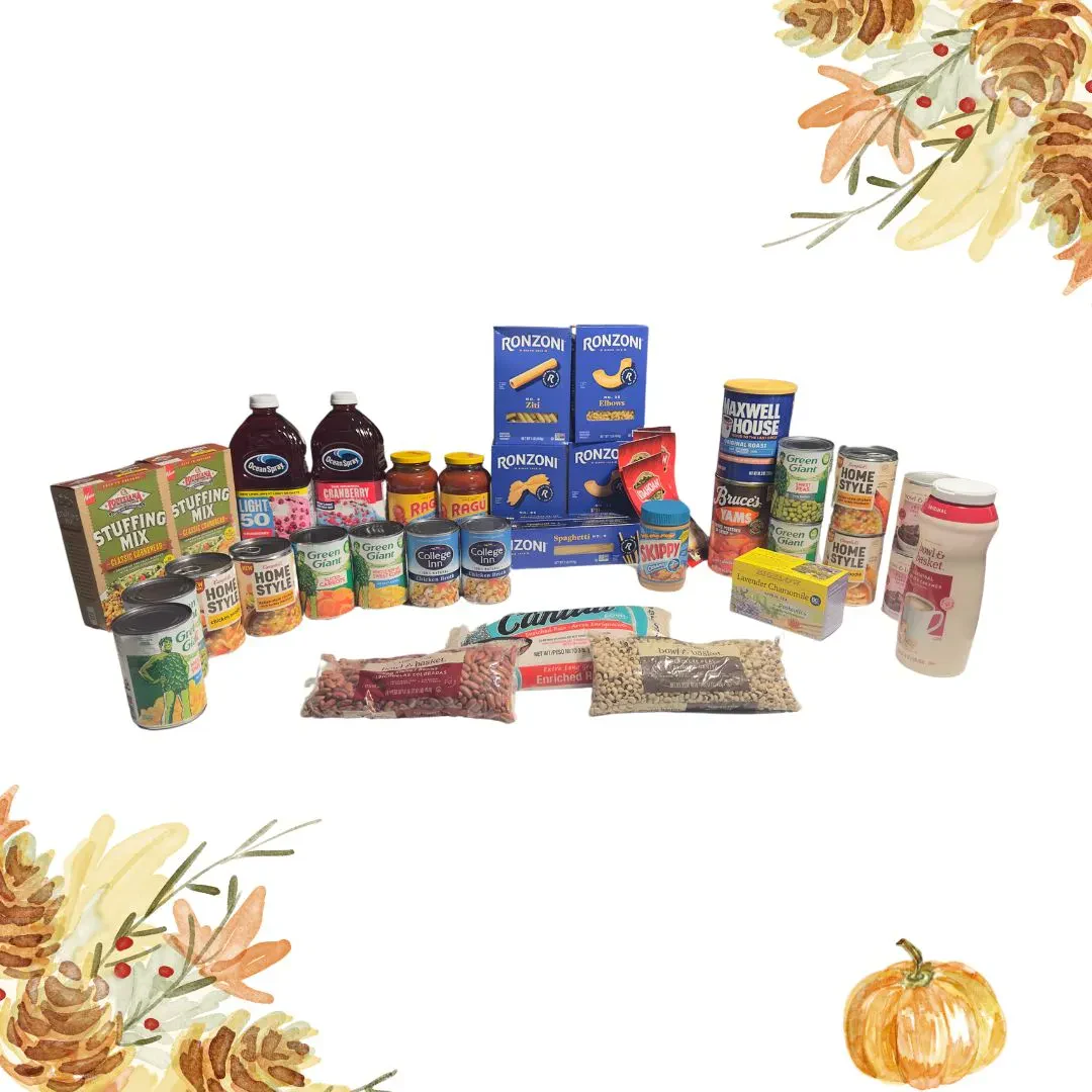 A variety of boxed, canned, and bottled food items are arranged in rows with autumn leaves and a pumpkin decorating the corners of the image.