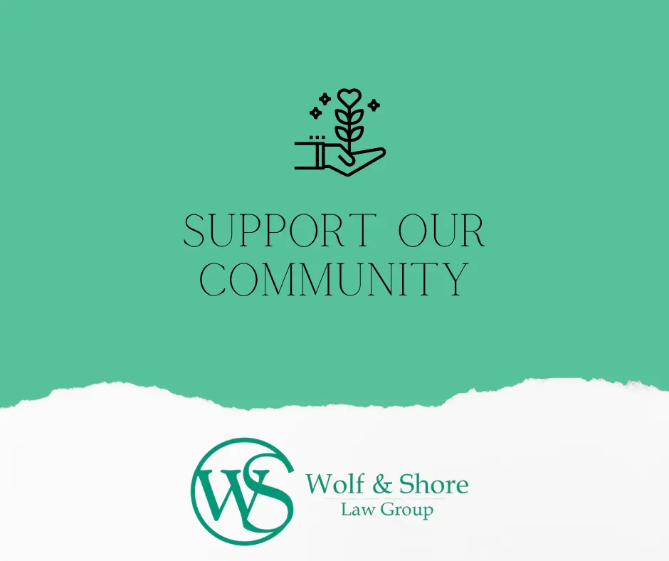 A graphic with a hand holding a plant, the text Support Our Community, and the Wolf & Shore Law Group logo on a green and white background.
